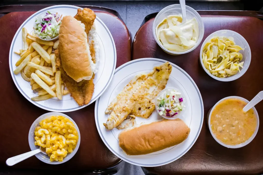 fish fry family meal with crispy fried fish fries coleslaw and seafood sides 2026