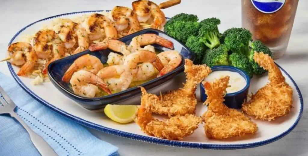 Shrimp Your Way Choose Two featured seafood combo meal with crispy shrimp garlic shrimp scampi and side dishes 2026