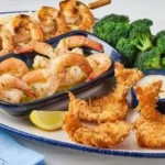 Shrimp Your Way Choose Two featured seafood combo meal with crispy shrimp garlic shrimp scampi and side dishes 2026