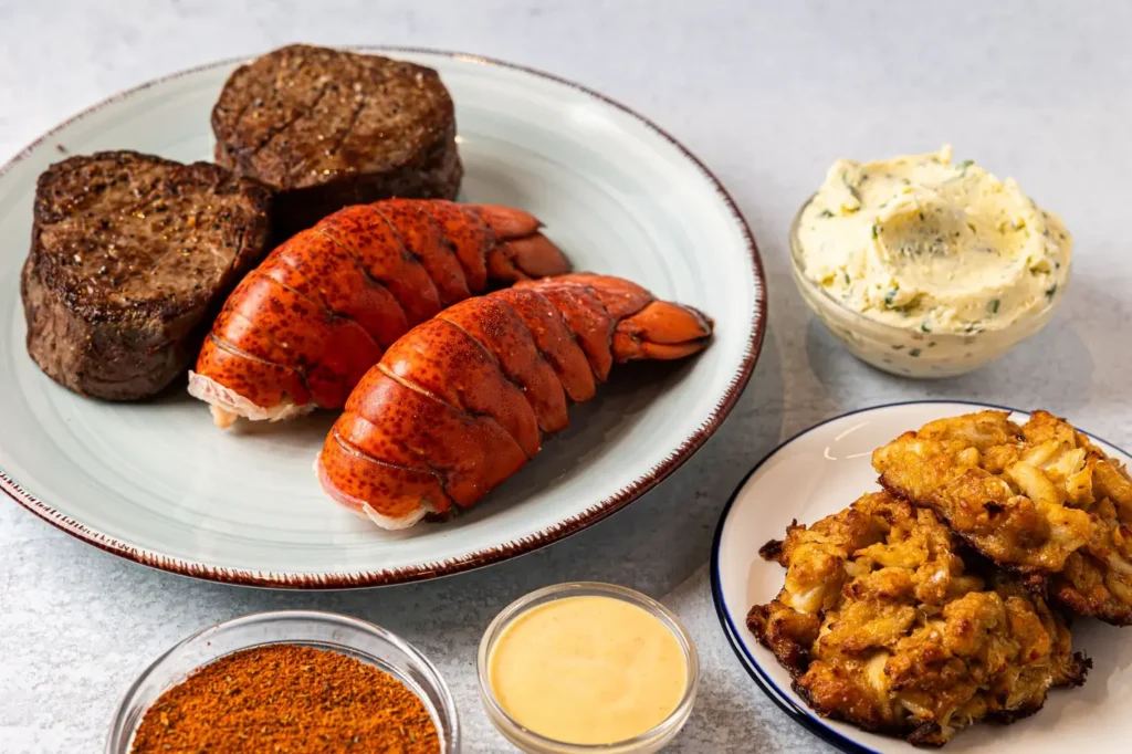 surf turf maine lobster tail 12 oz ny steak dinner with garlic butter and side dishes
