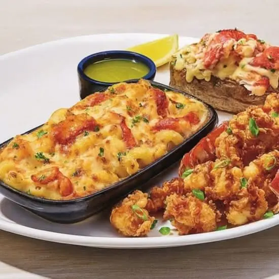 Choose two lobster favorites including Maine Lobster Tail, Garlic Butter-Poached Lobster, and Lobster & Shrimp Linguini at Red Lobster.